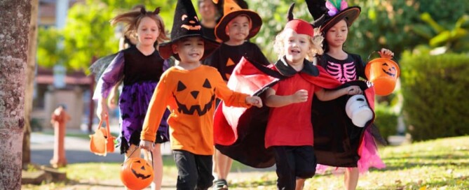 Kids dressed in Halloween costumes