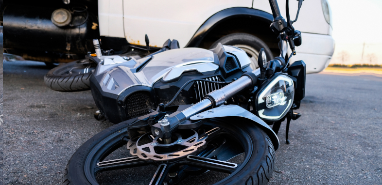 motorcycle tipped over on road