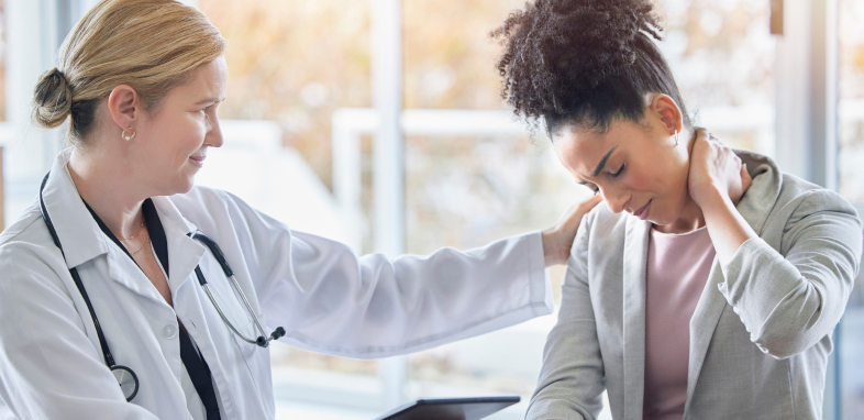 doctor observing woman holding neck in discomfort