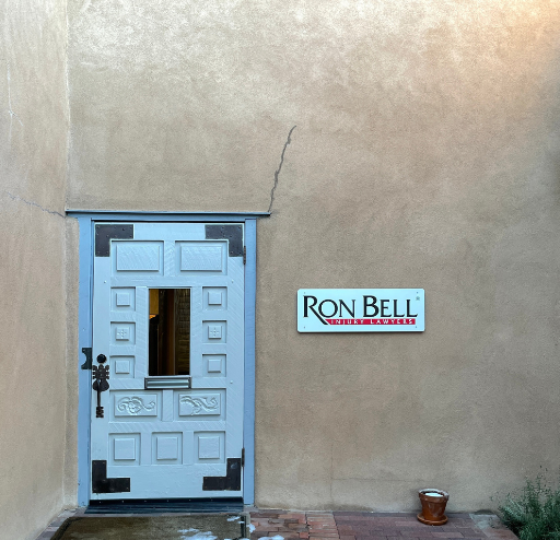 front door to law office showcasing Ron Bell Injury Attorneys signage