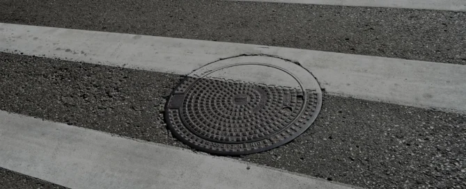 Marcus Gustafsson settled for $18 million after he fell into an open manhole and a jury awarded him $85 million.